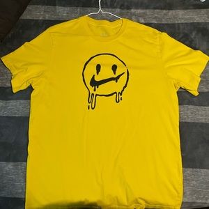 size large yellow smiley nike tshirt